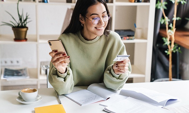 Woman holding a credit card