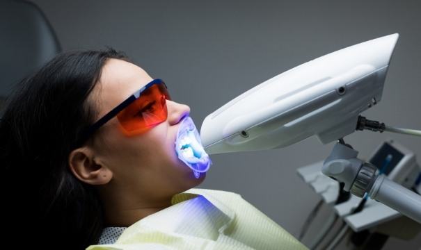 Dental patient receiving teeth whitening