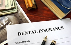 dental insurance to help cost of dentures in Boston