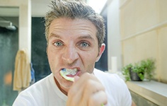 Man brushing his teeth