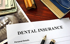 dental insurance form on table