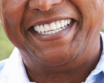 Closeup of flawless smile after emergency dentistry