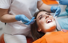 A woman receiving a dental checkup