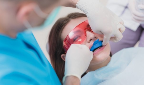 Patient receiving fluoride treatment