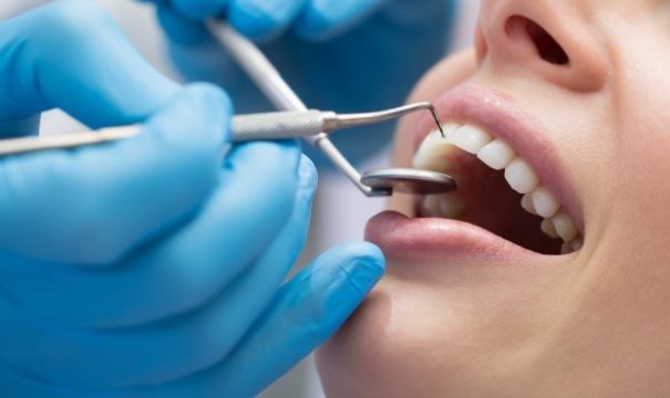 Patient receiving periodontal therapy